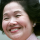 Hong Kong Chief Secretary Anson Chan smiles during a news conference announcing her resignation in Hong Kong January 12, 2001. [Chan's departure signals the most significant government change since Britain returned the rich capitalist outpost to communist China in mid-1997 after more than 150 years of colonial rule.